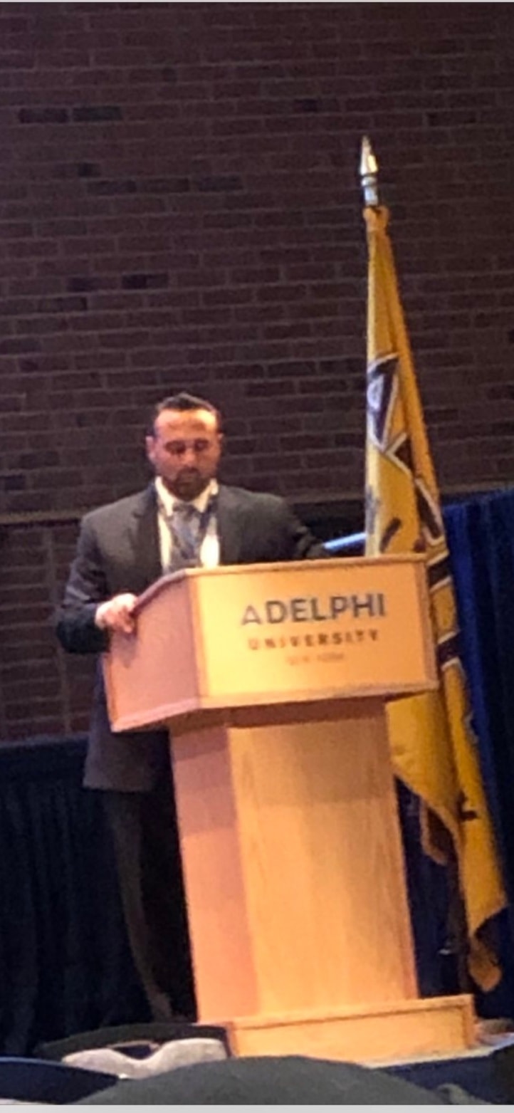 Dr. Tomei at Adelphi University podium